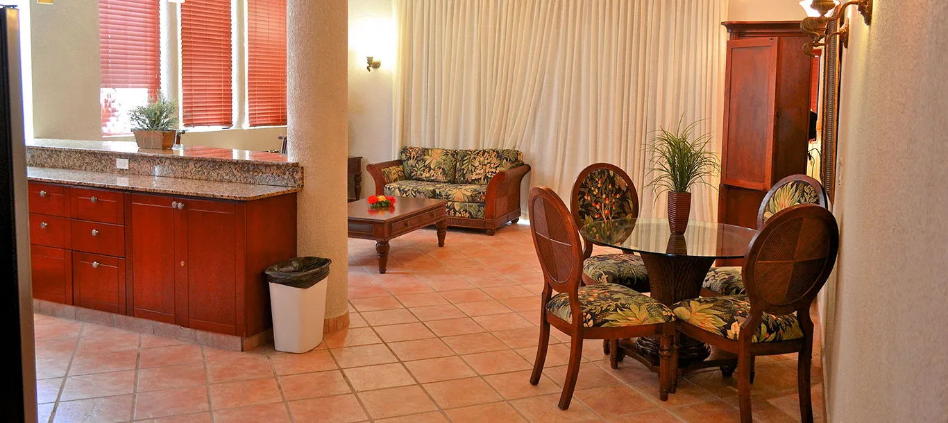 Living area in a master suite at Las Sirenas by Mayan Princess Roatan